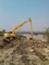 Excavator extension arm for foundation pit, caisson, basement excavation